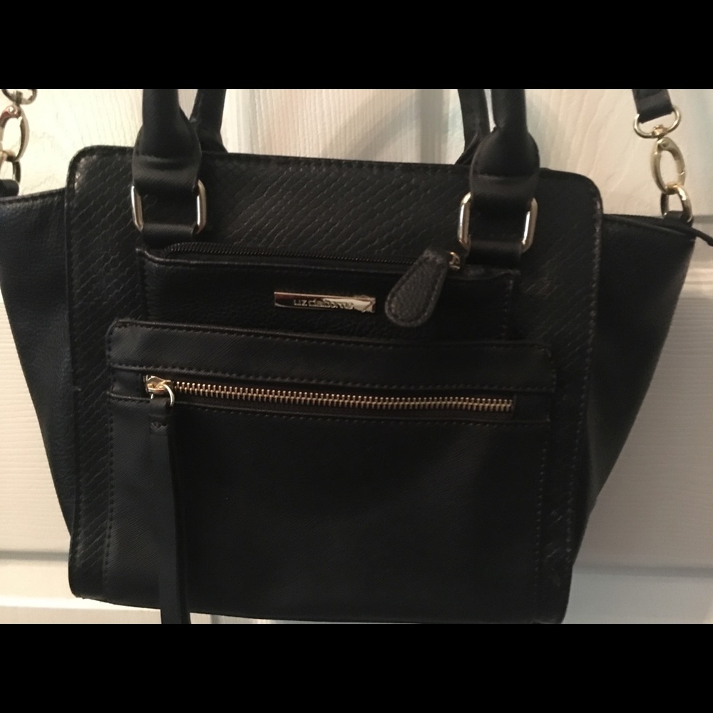 Liz Claiborne Black purse with strap or handles.
